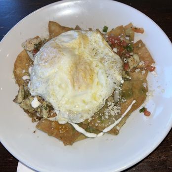 PKWY Tavern - Centennial - Chilaquiles with over medium eggs & grilled chicken - Breakfast & Brunch Near Me - Las Vegas, Nevada PKWY Tavern - Centennial - Chilaquiles with over medium eggs & grilled chicken - Breakfast & Brunch Near Me - Las Vegas, Nevada