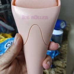 Trophy Smile Studio - Ice roller. Take out of freezer. I gently rolled on my cheek and neck. It seems to help with the swelling. Just my opinion