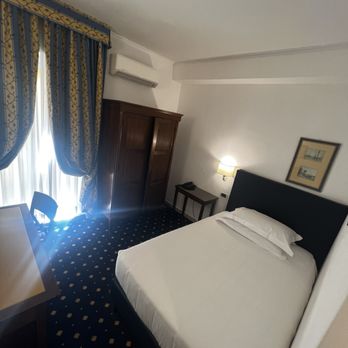 Hotel Napoleon - Room Description. Double Room Single. The cabinet has a safe, but the cabinet door will not open. So you can't get to the safe. - Hotels Near Me - Rome, RM Hotel Napoleon - Room Description. Double Room Single. The cabinet has a safe, but the cabinet door will not open. So you can't get to the safe. - Hotels Near Me - Rome, RM