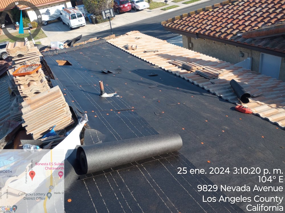 Slide of Johan Roofing