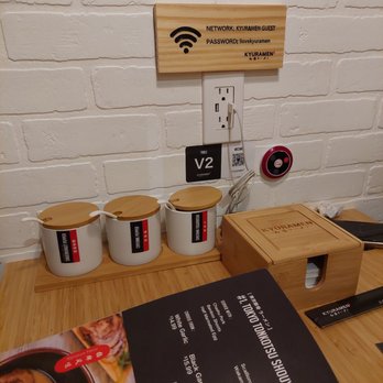 Kyuramen - Bayside - Charging station at the table. - Ramen Near Me - Bayside, New York Kyuramen - Bayside - Charging station at the table. - Ramen Near Me - Bayside, New York