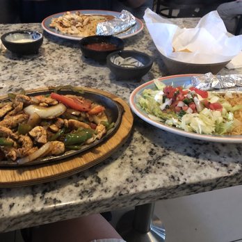 Campestre - Fajitas with the chicken and queso in the background - Mexican Near Me - Beckley, West Virginia Campestre - Fajitas with the chicken and queso in the background - Mexican Near Me - Beckley, West Virginia