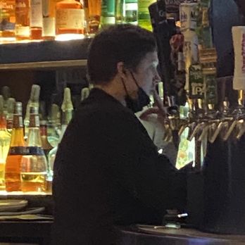 BJ's Restaurant & Brewhouse - Bartender breaking mask mandate customers are held to while touching mouth and he did not wash hands after but he made and served drinks - New American Near Me - Frederick, Maryland