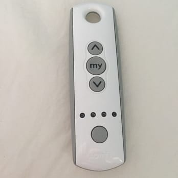 2-DayBlinds - The 5 channel remote. Works great and can be hung right next to the bed. - Shades & Blinds Near Me