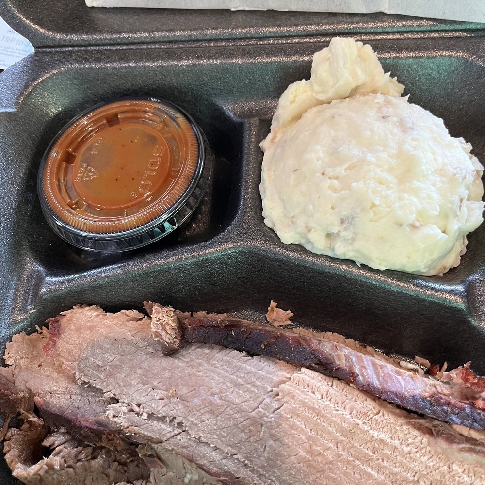 Sliced beef, brisket platter with delicious mashed potatoes. Sliced beef, brisket platter with delicious mashed potatoes.