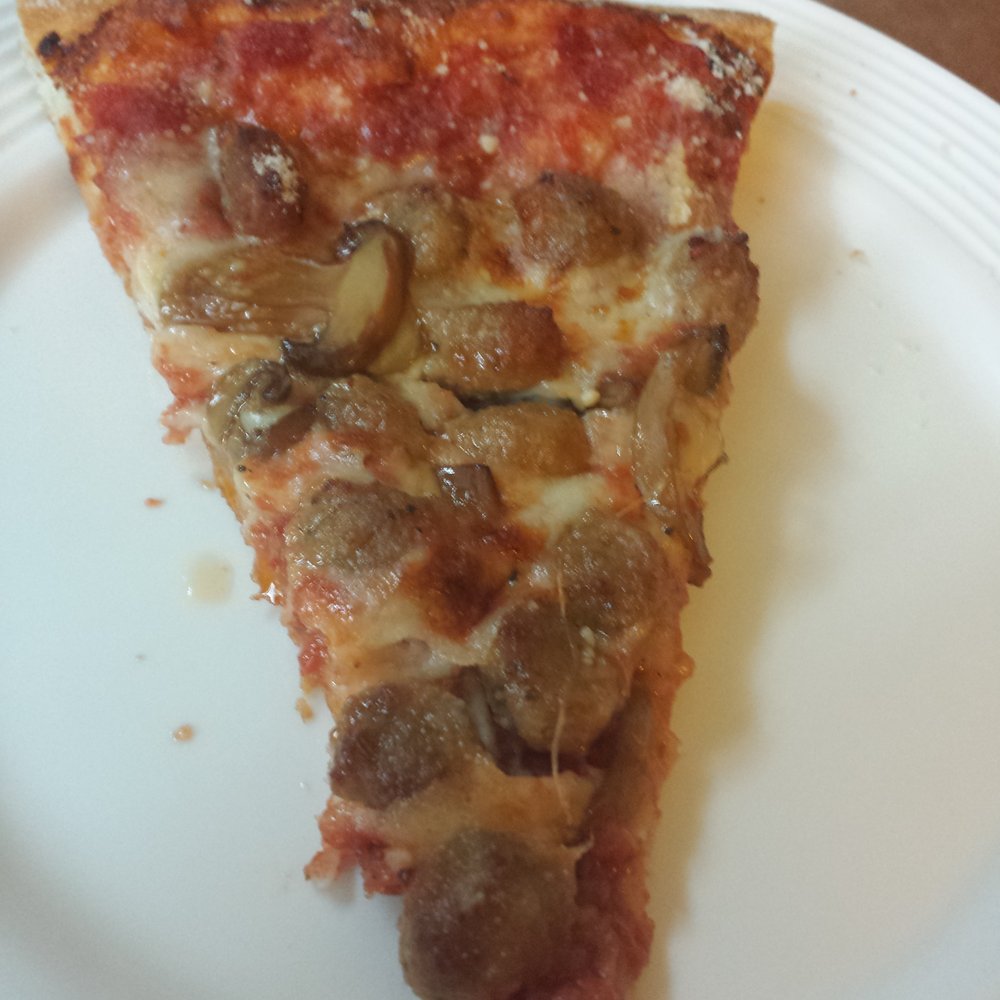 PJ's Pizza - My sausage and mushroom slice - can't complain about topping quantity. Just wish they used fresh mushrooms. - Pizza Near Me - Cross Plains, Wisconsin PJ's Pizza - My sausage and mushroom slice - can't complain about topping quantity. Just wish they used fresh mushrooms. - Pizza Near Me - Cross Plains, Wisconsin