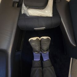 British Airways - BA284 SFO-LHR - lots of leg room! The foot rest can be pulled closer.