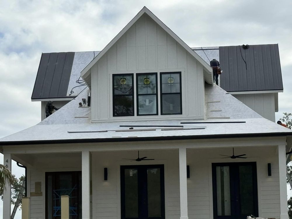 Slide of Woody's Roofing