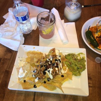 The Porch - This small thing of nachos is NOT worth $15 lmao never coming here again. Quality is great but the portion size is crap - Cocktail Bars Near Me - Tempe, Arizona