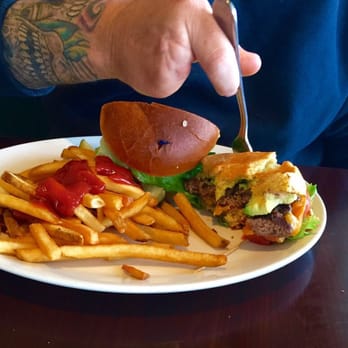 Rick's Restaurant - Ricks burger with lettuce, tomato, avocado & crispy fries... Big Angus burger very tasty! ( sorry bad pic) - Cuban Near Me - Palm Springs, California Rick's Restaurant - Ricks burger with lettuce, tomato, avocado & crispy fries... Big Angus burger very tasty! ( sorry bad pic) - Cuban Near Me - Palm Springs, California