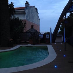 Hôtel du Petit Palais - Pool at dusk