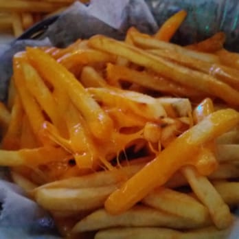 Mother Hubbard's - Yummy cheese fries - Sports Bars Near Me - Chicago, Illinois