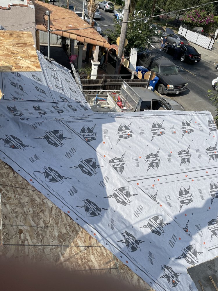 Slide of Oscar Roofing  services