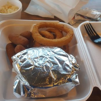 Cook Out - a tray of food with onion rings, onion rings, and a fork - Fast Food Near Me - Maryville, Tennessee Cook Out - a tray of food with onion rings, onion rings, and a fork - Fast Food Near Me - Maryville, Tennessee