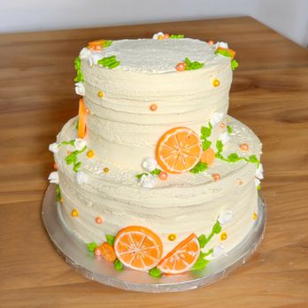 Griffin's Cakes & Pastries - Whipped cream frosted 2 tier cake - Desserts Near Me Griffin's Cakes & Pastries - Whipped cream frosted 2 tier cake - Desserts Near Me