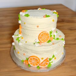 Griffin's Cakes & Pastries - Whipped cream frosted 2 tier cake