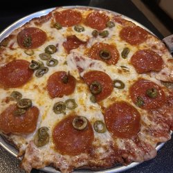 Cauliflower Crust Pizza with Pepperoni and Green Olives