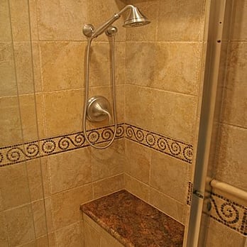 CarpetsPlus Colortile - a shower with a bench in the corner - Shades & Blinds Near Me - Swansea, Massachusetts