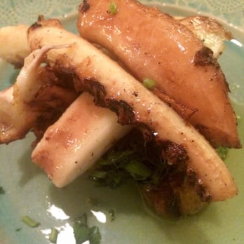 Quermesse - Pulpo (grilled octopus) atop spinach and roasted potatoes - Mediterranean Near Me - Lisbon, 11 Quermesse - Pulpo (grilled octopus) atop spinach and roasted potatoes - Mediterranean Near Me - Lisbon, 11