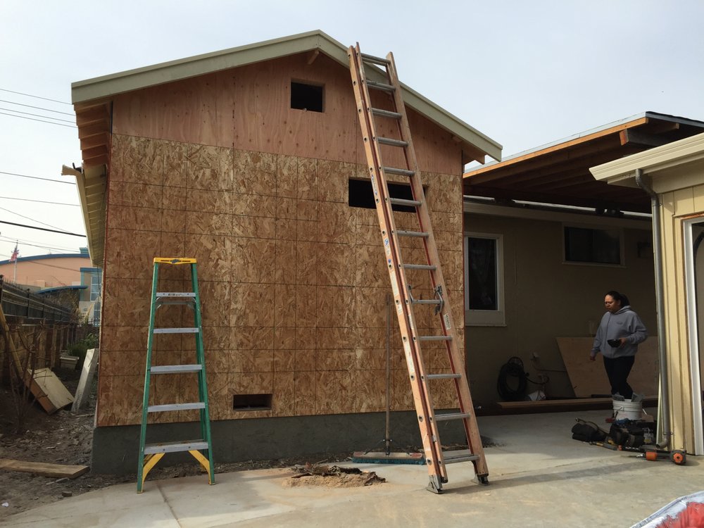 Slide of SH Roofing & Construction