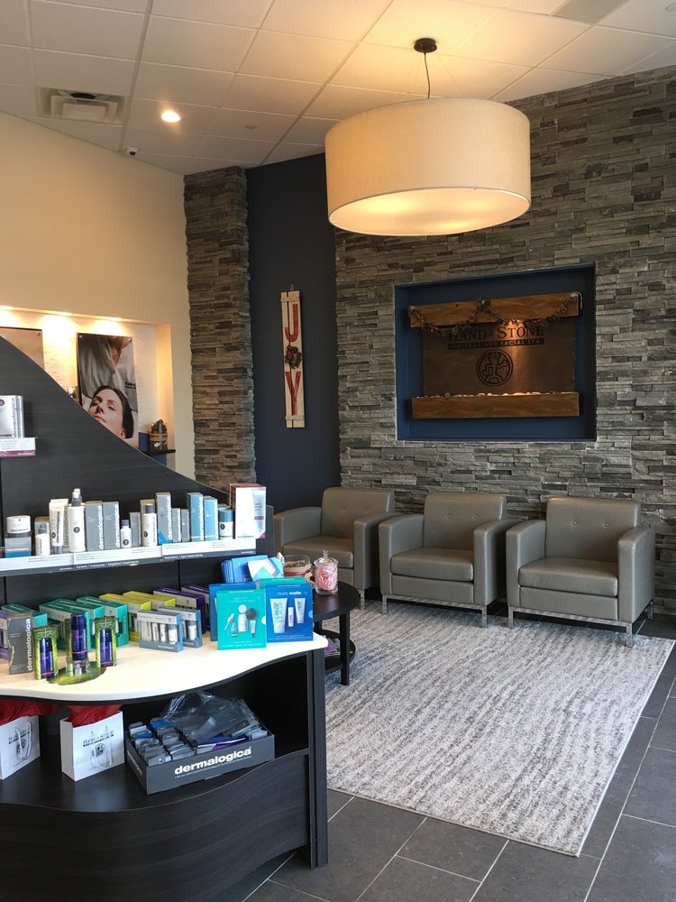 Hand & Stone Massage and Facial Spa Logo