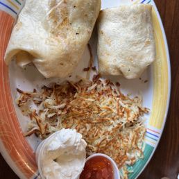 Breakfast burrito minus meat substituted avocado. No Tater tots but hash browns.