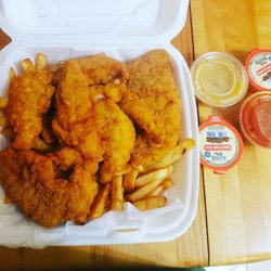 D & E Pizza & Subs - Chicken tender dinner with fries and different sauces.