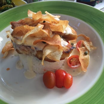 Guanabanas - Antigua - Local Fresh Catch sauteed with a white wine caper sauce, then finished with fresh tomatoes & served over rice and seasonal veggies - Seafood Near Me - Jupiter, Florida