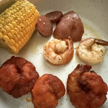Texas Crab Company - Sample plate of buffalo shrimp, and some of the shrimp tray. - Seafood Near Me - San Marcos, Texas Texas Crab Company - Sample plate of buffalo shrimp, and some of the shrimp tray. - Seafood Near Me - San Marcos, Texas