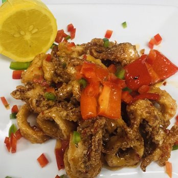 Ruth's Chris Steak House - CALAMARI- fried and tossed with a sweet and spicy asian chili sauce : so yummy if you love seafood - Steakhouses Near Me - Toronto, Ontario Ruth's Chris Steak House - CALAMARI- fried and tossed with a sweet and spicy asian chili sauce : so yummy if you love seafood - Steakhouses Near Me - Toronto, Ontario