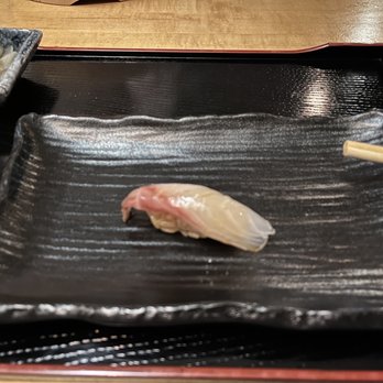 Momi Nonmi - a plate of sushi and chopsticks - Japanese Near Me - Cambridge, Massachusetts Momi Nonmi - a plate of sushi and chopsticks - Japanese Near Me - Cambridge, Massachusetts
