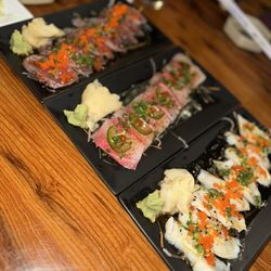 Dzo Pho Sushi Hibachi - Tuna tataki, yellowtail app and conch app.