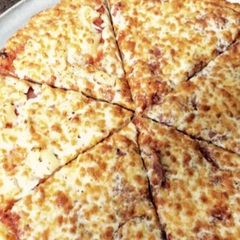 Dillo's Pizza - a cheese pizza cut into eight slices - Pizza Near Me - Calgary, Alberta Dillo's Pizza - a cheese pizza cut into eight slices - Pizza Near Me - Calgary, Alberta