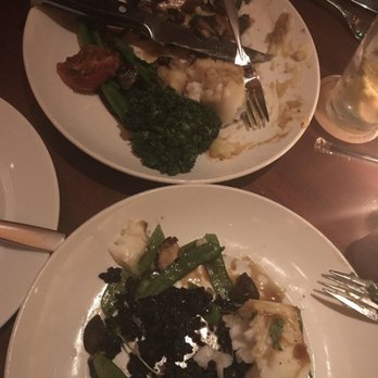 Seasons 52 - Shitty fish dish. Half in his half on hers .... oh there's the tree I was talking about in my review. - New American Near Me - Princeton, New Jersey