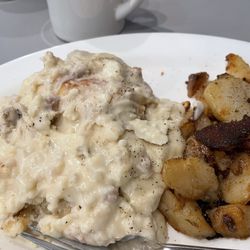 Toni's Grill - Sausage gravy with one biscuit.....Couldn't eat it all!