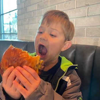 Eureka! - I think he's excited about his Eureka burger. What do you think? - American Near Me - Aliso Viejo, California