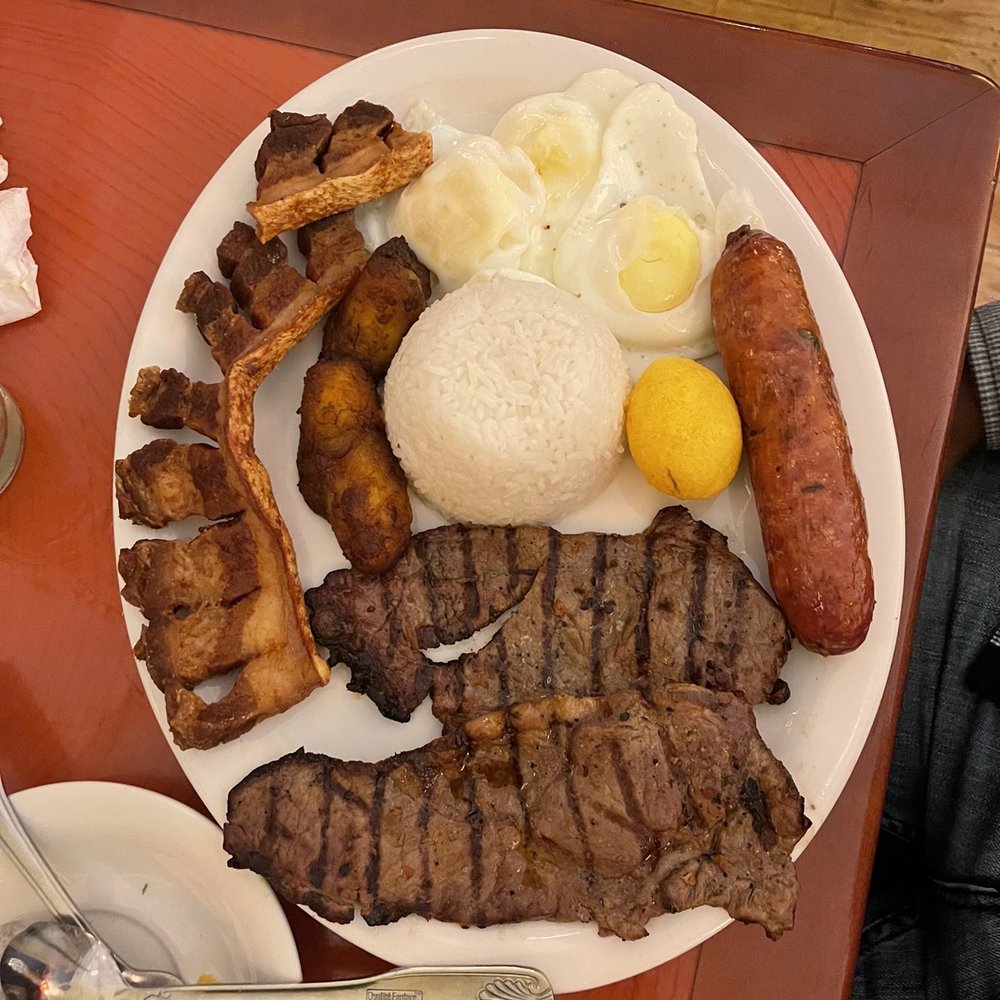 La Casona - Steak, pork, white rice, eggs, and Sausage - Colombian Near Me - Central Falls, Rhode Island La Casona - Steak, pork, white rice, eggs, and Sausage - Colombian Near Me - Central Falls, Rhode Island