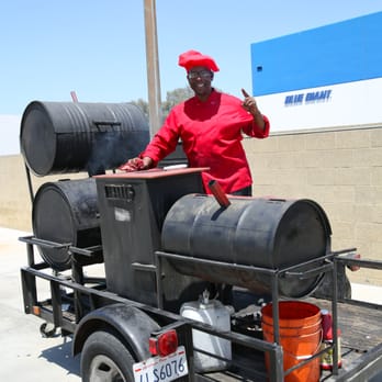 Robert Earl's BBQ - Robert in his happy place. Photo credit Christopher Bennett. - Barbeque Near Me - Long Beach, California Robert Earl's BBQ - Robert in his happy place. Photo credit Christopher Bennett. - Barbeque Near Me - Long Beach, California