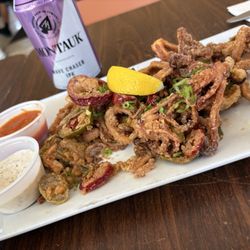 Dive - The best fried calamari! First time trying this seasoning style, and it was absolutely delicious crispy and full of flavor!