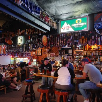 Wooden Chicken Pub - people sitting at the bar - New American Near Me - Portland, Oregon