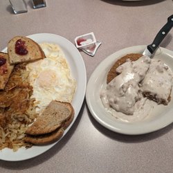 Charlie's Place - Country fried steak with eggs hash browns and toast..