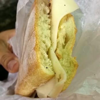 Première Moisson - Toasted Baguette with butter and Swiss Cheese - Bakeries Near Me - Montreal, Quebec Première Moisson - Toasted Baguette with butter and Swiss Cheese - Bakeries Near Me - Montreal, Quebec