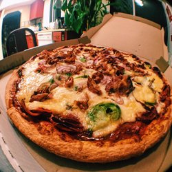 Rio Pizza - Jumbo-sized Rio Special, we replaced the olives with onions
