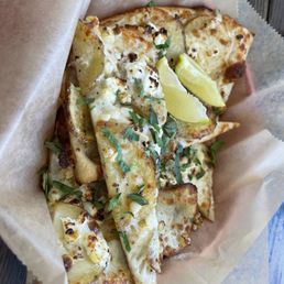 Special Pizza of the Day slices : corn, potato, chives, etc. Special Pizza of the Day slices : corn, potato, chives, etc.