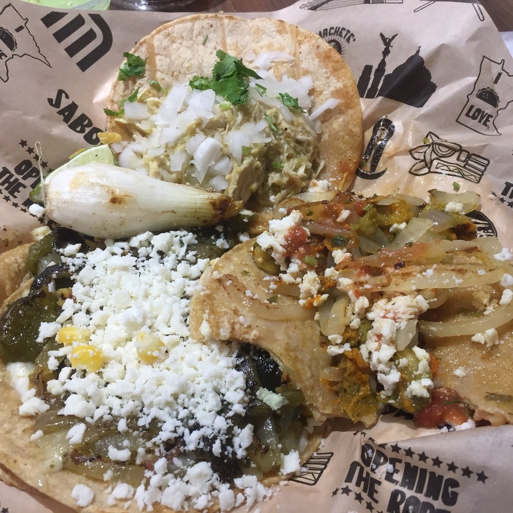 Taco Libre - Street tacos: poblano, pollo verde, and partly eaten pumpkin flower which was YUM. - Mexican Near Me - Minneapolis, Minnesota Taco Libre - Street tacos: poblano, pollo verde, and partly eaten pumpkin flower which was YUM. - Mexican Near Me - Minneapolis, Minnesota