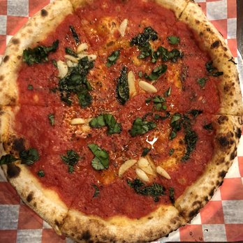 Donatina Neapolitan Pizza Cafe - Marinara sliced garlic & fresh basil. - Pizza Near Me - Patchogue, New York Donatina Neapolitan Pizza Cafe - Marinara sliced garlic & fresh basil. - Pizza Near Me - Patchogue, New York