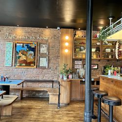 Maynard - Inside: tables and barstools, decorations
