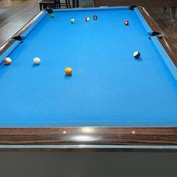 Town & Country Billiards - Normal sized pool table. They also have higher end ones and a smaller one you'd find in a bar.