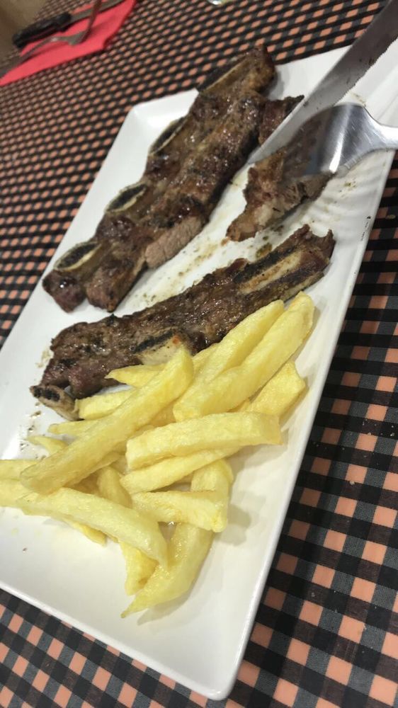 LAS BRASAS DEL TIO MANOLO Carrer de Veneçuela, Nord, Barcelona, Spain