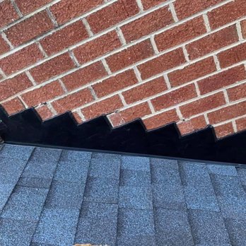 BK Roofing & Repairs - Close up on how our chimney flashing looks when roof is replaced. - Roofing Near Me